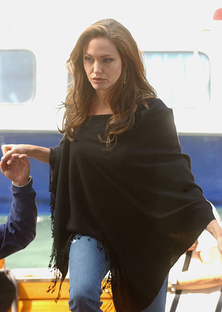 Actress Angelina Jolie arrives by boat for the "Shark Tale" photocall at the 61st Venice Film Festival on September 10, 2004 in Venice, Italy.