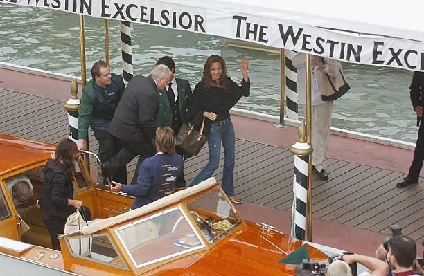 Actress Angelina Jolie arrives by boat for the "Shark Tale" Photocall at the 61st Venice Film Festival on September 10, 2004 in Venice, Italy.